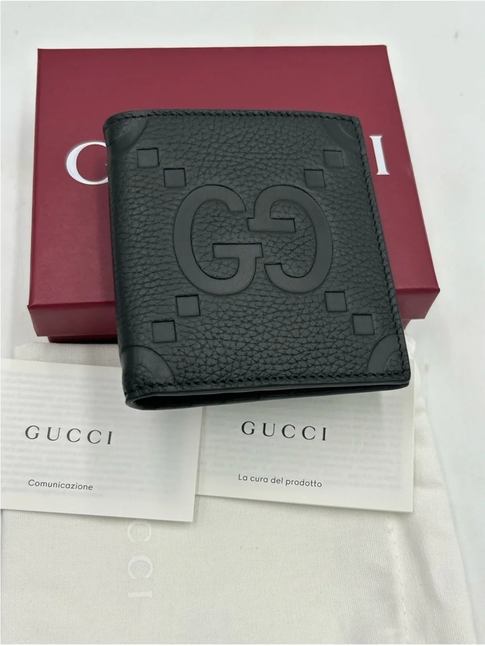 Men’s Gucci, jumbo GG leather bifold wallet made in Italy
